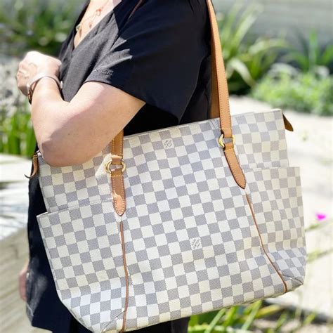 louis vuitton zipper tote|louis vuitton big tote bag.